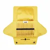 A yellow polka dot knitting needle case is open, displaying a set of knitting needles. Produktbild-Vorschau