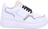 A white Rieker sneaker with black laces and beige accents is shown against a white background. Produktbild-Vorschau