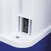 A close-up view of a switch on a white plastic device, with a blue surface visible in the background. Voir les images du produit