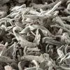 A close-up, overhead view of dried sage leaves. Produktbild-Vorschau