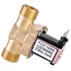 A close-up studio shot of a brass solenoid valve with a black coil. Podgląd zdjęcia produktu