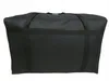 A black duffel bag with black straps against a white background. Náhled obrázku produktu