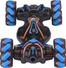 A top-down view of a remote-controlled stunt car with unique multi-directional wheels. Náhled obrázku produktu