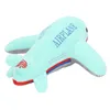 A plush toy airplane on a white background. Náhled obrázku produktu