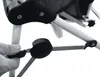 A close-up of a person's hand adjusting a black plastic component on a white frame, likely part of a baby swing or high chair. Produktbild-Vorschau