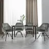 A dining set with four chairs around a table, set against a backdrop of curtains and a window. Produktbild-Vorschau