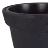Close-up view of the top rim and textured exterior of a dark-colored planter pot. Produktbild-Vorschau