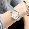 A person wearing a watch and bracelet. Náhľad obrázku produktu
