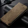 A close-up shot of a brown leather flip phone case for a Motorola Edge 50 Neo, placed on a dark surface. Produktbild-Vorschau
