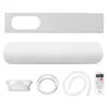 A collection of parts for a portable air conditioner, including a window vent, exhaust hose, hose adapter, and remote control, laid out against a white background. Produktbild-Vorschau