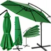 A green cantilever umbrella is shown in various states of assembly and storage, along with its base and cover. Produktbild-Vorschau