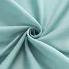 A close-up swirl of light green fabric. Produktbild-Vorschau