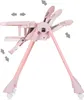 A pink baby high chair with adjustable features shown from the side. Produktbild-Vorschau