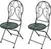 Two black metal folding chairs with ornate backs and round mesh seats are shown against a white background. Produktbild-Vorschau