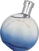 A round perfume bottle with a blue gradient and silver cap. Anteprima dell’immagine prodotto