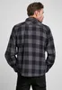 A man wearing a plaid shirt. Produktbild-Vorschau