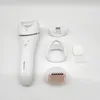 A white Philips epilator and its accessories are laid out on a white background. Náhled obrázku produktu