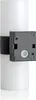 A close-up view of a white cylindrical LED outdoor light fixture with a dark gray mounting bracket and sensor. Produktbild-Vorschau
