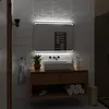 A modern bathroom vanity with a sink, mirror, and storage. Produktbild-Vorschau
