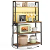 A multi-tiered kitchen shelf unit with various kitchen appliances and cookware displayed on its shelves. Produktbild-Vorschau