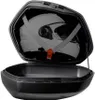 A white motorcycle helmet is secured with straps inside an open black motorcycle top case. Produktbild-Vorschau