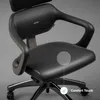 A close-up view of a black ergonomic office chair with a gray accent. Náhled obrázku produktu