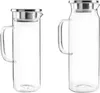 Two glass carafes with silver lids are shown side-by-side against a white background. Produktbild-Vorschau