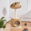 Two cats are on and inside a cat tree in a room. Produktbild-Vorschau