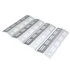 A set of four stainless steel grill heat plates arranged diagonally on a white background. Produktbild-Vorschau