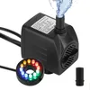 A black submersible water pump with a ring of multi-colored LED lights and a stream of water coming out of the top. Produktbild-Vorschau