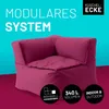 A corner beanbag chair is shown against a split cyan and magenta background, with text overlays describing its features. Voir les images du produit