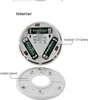The interior of a smoke detector showing batteries and the mounting bracket. Produktbild-Vorschau
