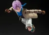 An action figure of Trunks from Dragon Ball GT in a dynamic pose against a black background. Voir les images du produit