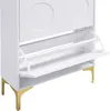 A white shoe cabinet with gold legs, shown from the front with one of the drawers open. Anteprima dell’immagine prodotto