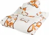 A folded blanket with a corgi puppy pattern. Anteprima dell’immagine prodotto