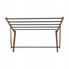 A wooden and black metal drying rack against a white background. Produktbild-Vorschau