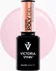 A bottle of Victoria Vynn Liquid Poly Gel in the shade 02 Sugar Cloud, presented against a soft pink circular background. Náhled obrázku produktu
