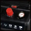 Close-up of an air compressor's control panel, showing a pressure gauge, a red knob, and a switch. Anteprima dell’immagine prodotto
