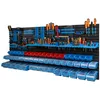 A wall-mounted tool organizer with various tools and storage bins. Náhled obrázku produktu