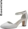 A white pump shoe with an ankle strap and block heel, shown from a side-diagonal angle against a white background. Náhľad obrázku produktu