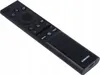 A black Samsung TV remote control is shown at an angle against a white background. Produktbild-Vorschau