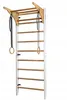 A white and wooden indoor climbing frame with gymnastic rings hanging from it. Produktbild-Vorschau