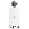A white cabinet with a black handle and black legs, topped with a vase of dried flowers. Podgląd zdjęcia produktu