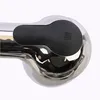 A close-up of a chrome faucet with a black handle. Produktbild-Vorschau