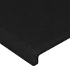 A close-up view of a black fabric headboard with a rounded edge. Produktbild-Vorschau