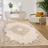 A living room scene with a rug, armchair, and cabinet. Voir les images du produit