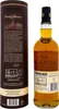 A bottle of Knockando 15 Years Single Malt Scotch Whisky and its accompanying cylindrical box. Produktbild-Vorschau