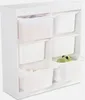 A white storage unit for children's toys with six plastic bins. Produktbild-Vorschau
