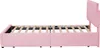 Side view of a pink upholstered bed frame with a slatted mattress base and a tufted headboard, shown against a white background. Náhled obrázku produktu