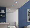 Interior view of a modern living space with blue walls and ceiling lights. Náhled obrázku produktu